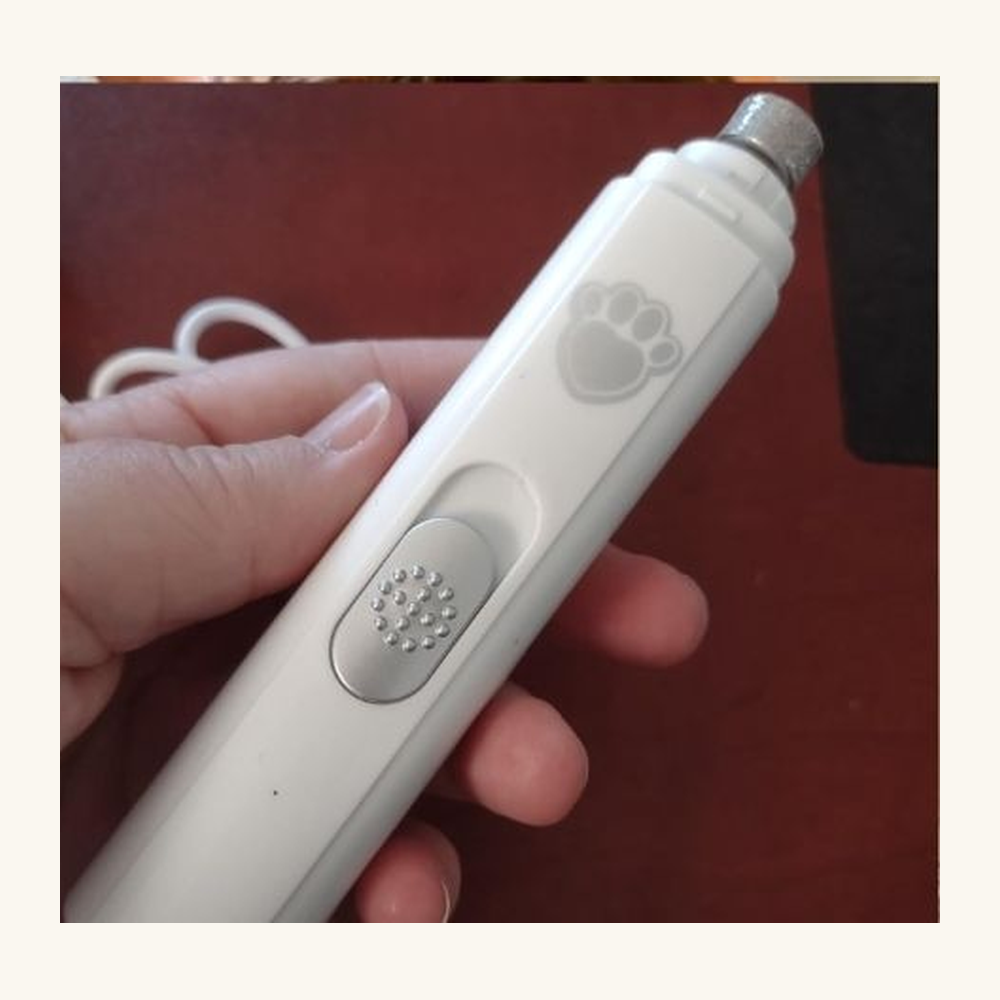Tailton Nail Grinder Pro in hand – whisper-quiet dog nail grinder